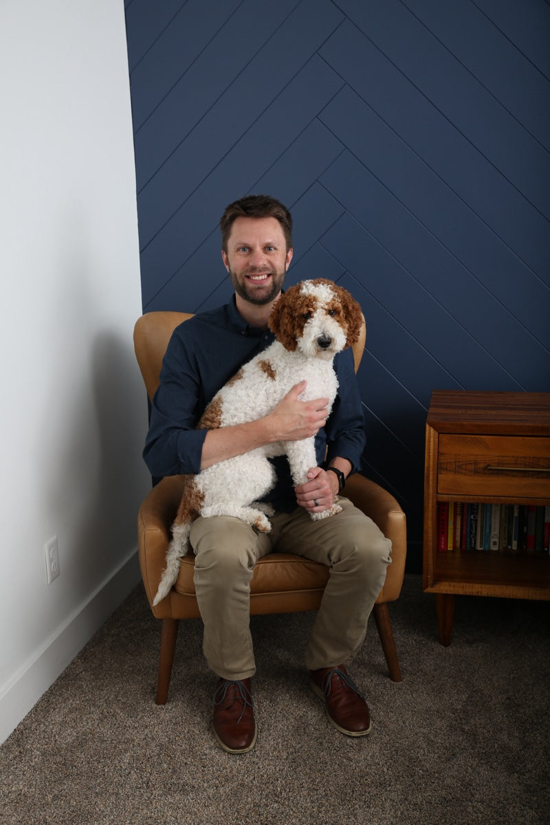 Jim, founder of Nextrition Pets, with his dog